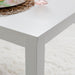 Elegant White Sixty Inch Contemporary Dining Table