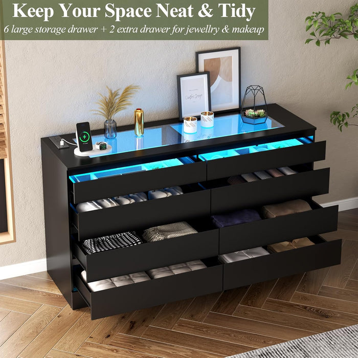 White Eight Drawer Dresser Featuring Electrical Outlet