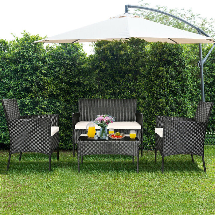 4 Pieces Patio Rattan Cushioned Sofa Set with Tempered Glass Coffee Table