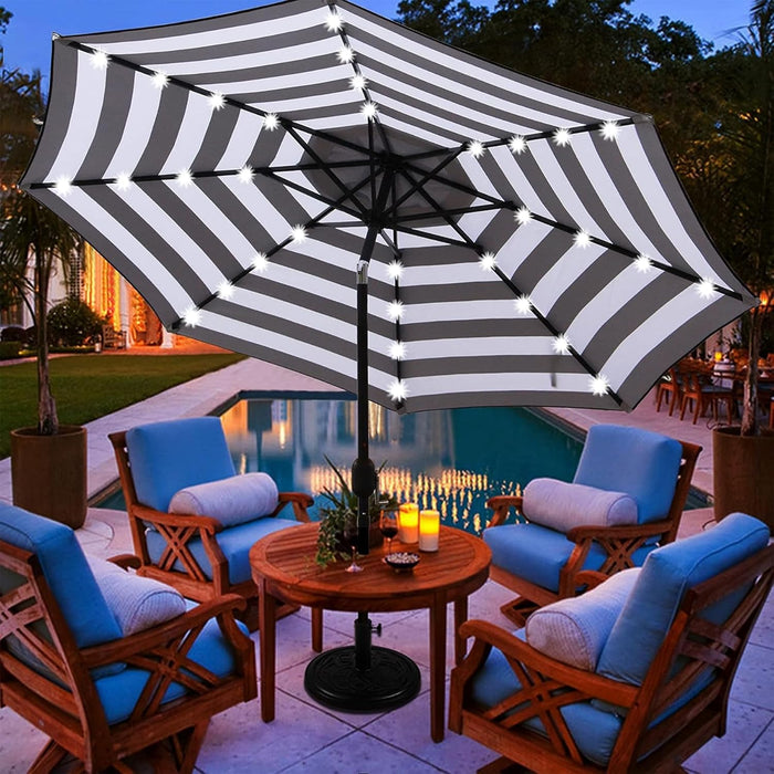 9 Ft Solar Umbrella 32 LED Lighted Patio Umbrella Table Market Umbrella with Tilt and Crank Outdoor Umbrella for Garden, Deck, Backyard, Pool and Beach (Black and White)