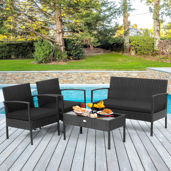 4 Piece Patio Rattan Conversation Set, Outdoor Wicker Furniture Set W/Glass Coffee Table, Solid Steel Structure, Ergonomic Seat, Suitable for Garden, Courtyard, Balcony, Poolside