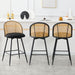 Swivel Counter Height Bar Stools Set of 3, Mid Century Modern 26" Bar Chairs with Rattan Back & Metal Legs, Upholstered Boucle Fabric Barstools Island Stools for Kitchen Counter Home Bar,Black