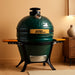 13-Inch Ceramic Kamado Grill, Waterproof Vent Cap, Green | Charcoal-Fired Tabletop Kamado with a Waterproof Vent Cap That Helps Shield the Top Vent from Rain during Outdoor Cooking.