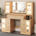 55" Vanity Desk with Mirror & Lights, Fluted Makeup Vanity with 8 Drawers & 4 Cabinets, Tempered Glass Top, RGB Cabinet Lighting, 3-Color Dimmable Mirror, and Charging Station