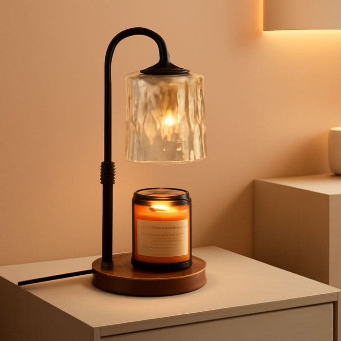 Walnut-Base Candle Warmer Lamp Walnut-base candle warmer lamp with a curved black arm and clear glass shade