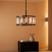 Matte Black Crystal Chandelier Featuring Four Lights