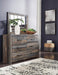 Drystan Weathered Brown Rusticated Six Drawer Dresser