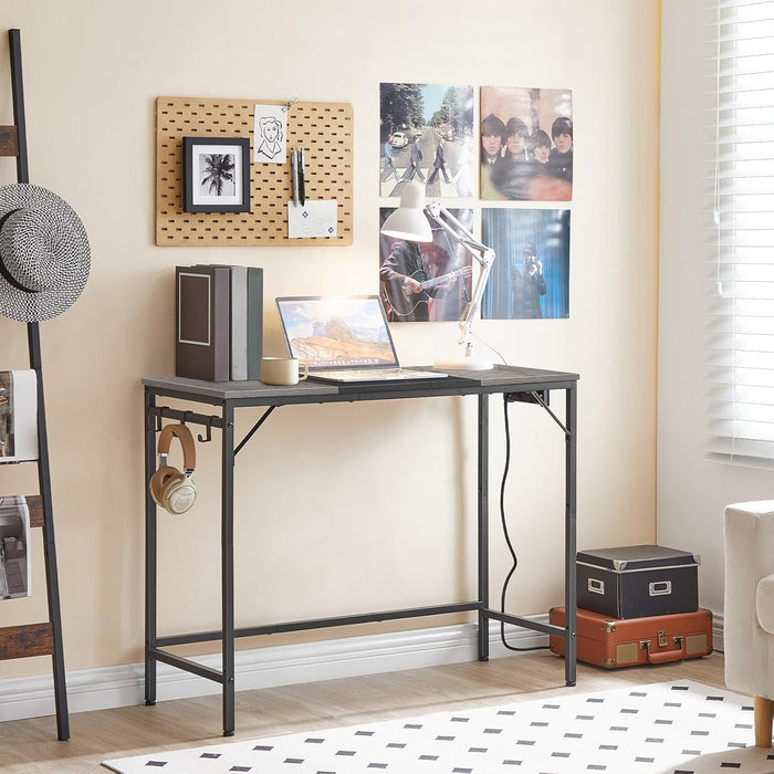 Computer Desk, Home Office Desk with Power Outlet, Modern Study Writing Desk with 3 Hooks for Study Room, Home Office, Sturdy and Stable, Easy to Assemble, Charcoal Gray and Black BC41UDN01