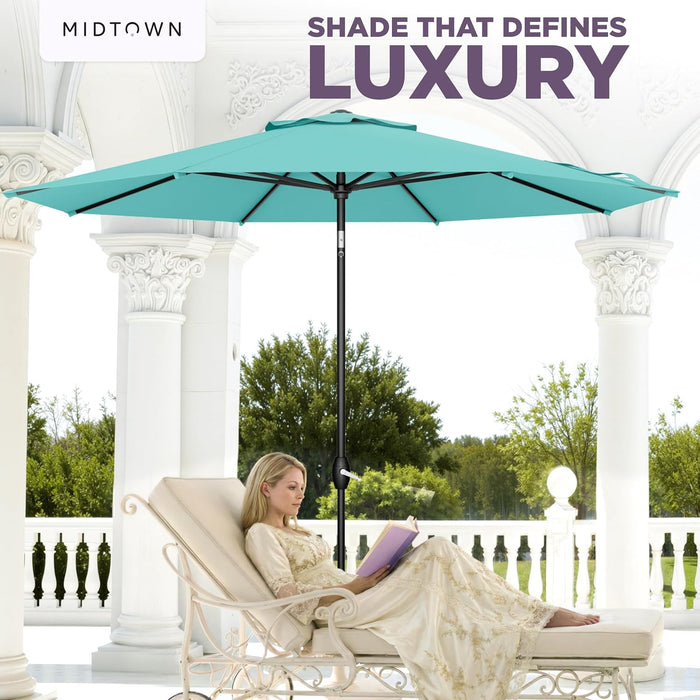 - the Lean 10 Ft Patio Umbrella with Fade-Resistant Sunbrella Fabric, Auto-Tilt Aluminum Frame and 8 Reinforced Ribs for Deck, Pool & Garden - Canvas Glacier Canopy, Black Pole
