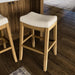 31" Sophia Backless Bar Stool - Handcrafted Plush Upholstered Saddle Seat with Six-Panel Stitching & Nailhead Trim - Space Saving Wood Barstool in Aged Natural Finish W/Light Beige Fabric