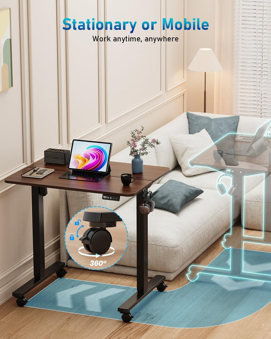 32" Small Electric Rolling Standing Desk Adjustable Height, Mobile Sit Stand up Desk with Lockable Casters for Home Office & Computer Workstation, Splice Board, 2 Hooks, Black Frame/Walnut Top