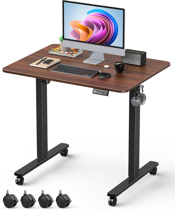 32" Small Electric Rolling Standing Desk Adjustable Height, Mobile Sit Stand up Desk with Lockable Casters for Home Office & Computer Workstation, Splice Board, 2 Hooks, Black Frame/Walnut Top