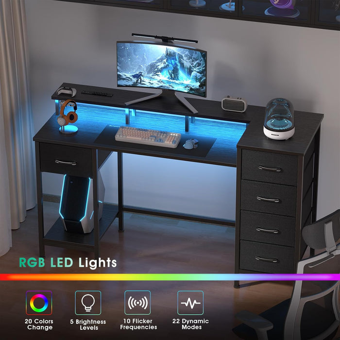 47 Inch Gaming Desk with Power Outlets and LED Lights, Reversible Computer Desk with 5 Fabric Storage Drawers, Home Office Desk with Monitor Stand for Working Writing Study, Black