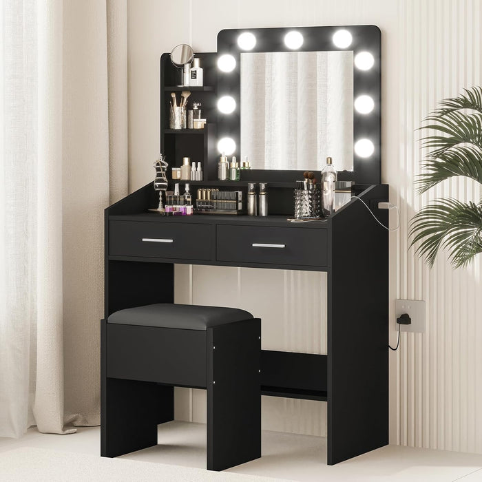 Black Vanity Table Set with Mirror – Dimmable LED Lights, Built-In Power Outlet, 7 & 2 Storage Drawers, Cushioned Stool, Adjustable Light Color, Hairdryer Holder – Bedroom, Black