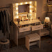 White Makeup Vanity Desk Featuring Illuminated Mirror