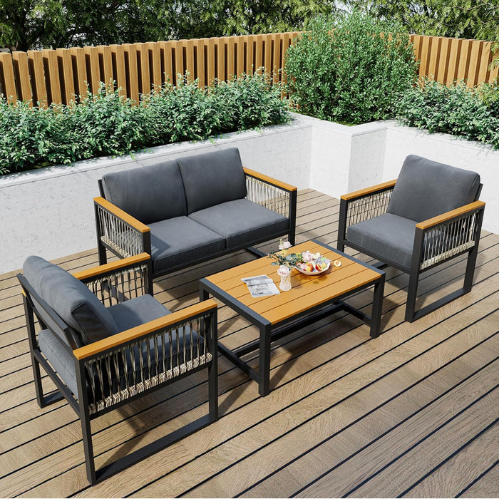 4 Pieces Outdoor Patio Furniture Set with Wicker Handrails, Plastic-Wood Balcony Furniture with Wicker Arm Panel, All-Weather Metal Outdoor Furniture Set with Cushion and Coffee Table