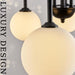 Modern Black Chandelier 6 Lights Sputnik Chandelier for Dining Room Large L40” Mid Century Ceiling Pendant Light Fixtures with Withe Glass Globe Shades for Foyer Bedroom