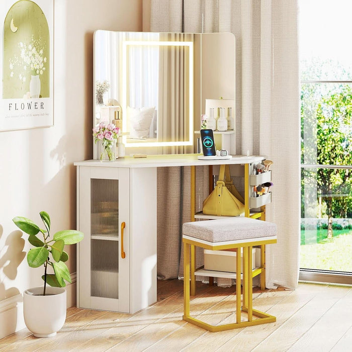 Corner Vanity Desk with Lighted Tri-Fold Mirror, Makeup Table with Charging Station, Fluted Door Cabinet, Storage Shelves, Space Saving Dressing Table with Stool for Bedroom, White & Gold