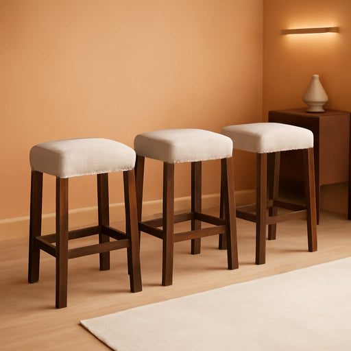 26 Inch Solid Wood Saddle Backless Bar Stools Set of 3, Beige | Counter Height Barstools with Footrest & Nailhead Trim, Modern Farmhouse Upholstered Linen Counter Stools for Kitchen Island