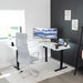 Corner Standing Desk, 63 X 55 Inch Reversible L-Shaped Workstation, Electric Height Adjustment, Home, Office, and Reception Rooms, White Table Top Black Frame, DESK-E3CTBW